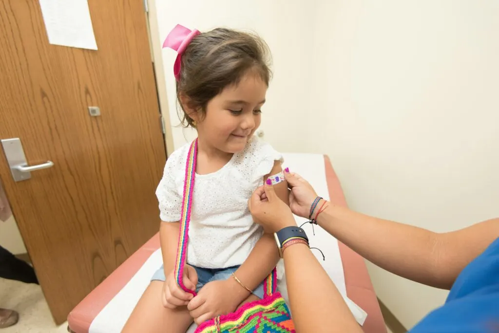 Dengue Vaccine| VacciBuddy| Doctor giving vaccine to a little girl