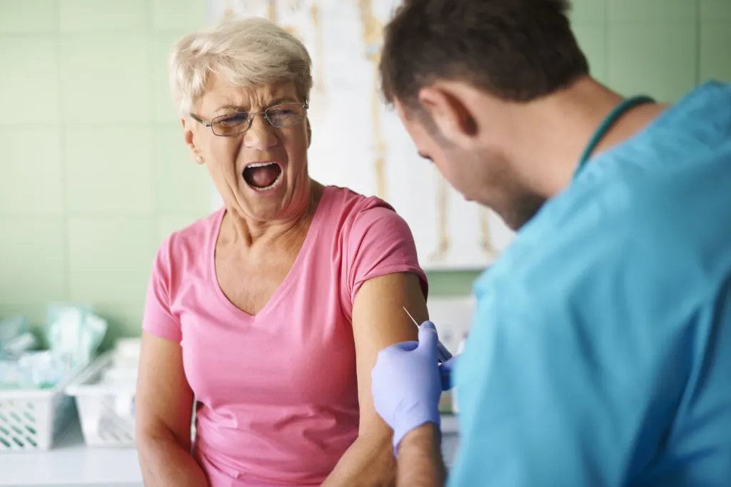 Tetanus vaccine| VacciBuddy| Doctor giving vaccine to an old lady