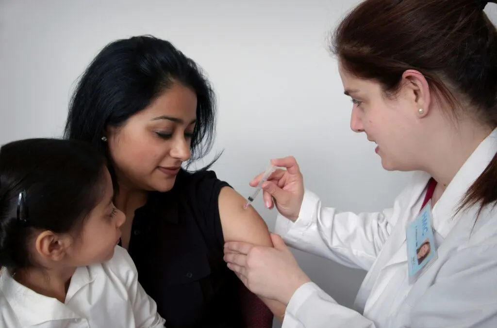 Japanese Encephalitis Vaccine| VacciBuddy| Doctor giving vaccine to people