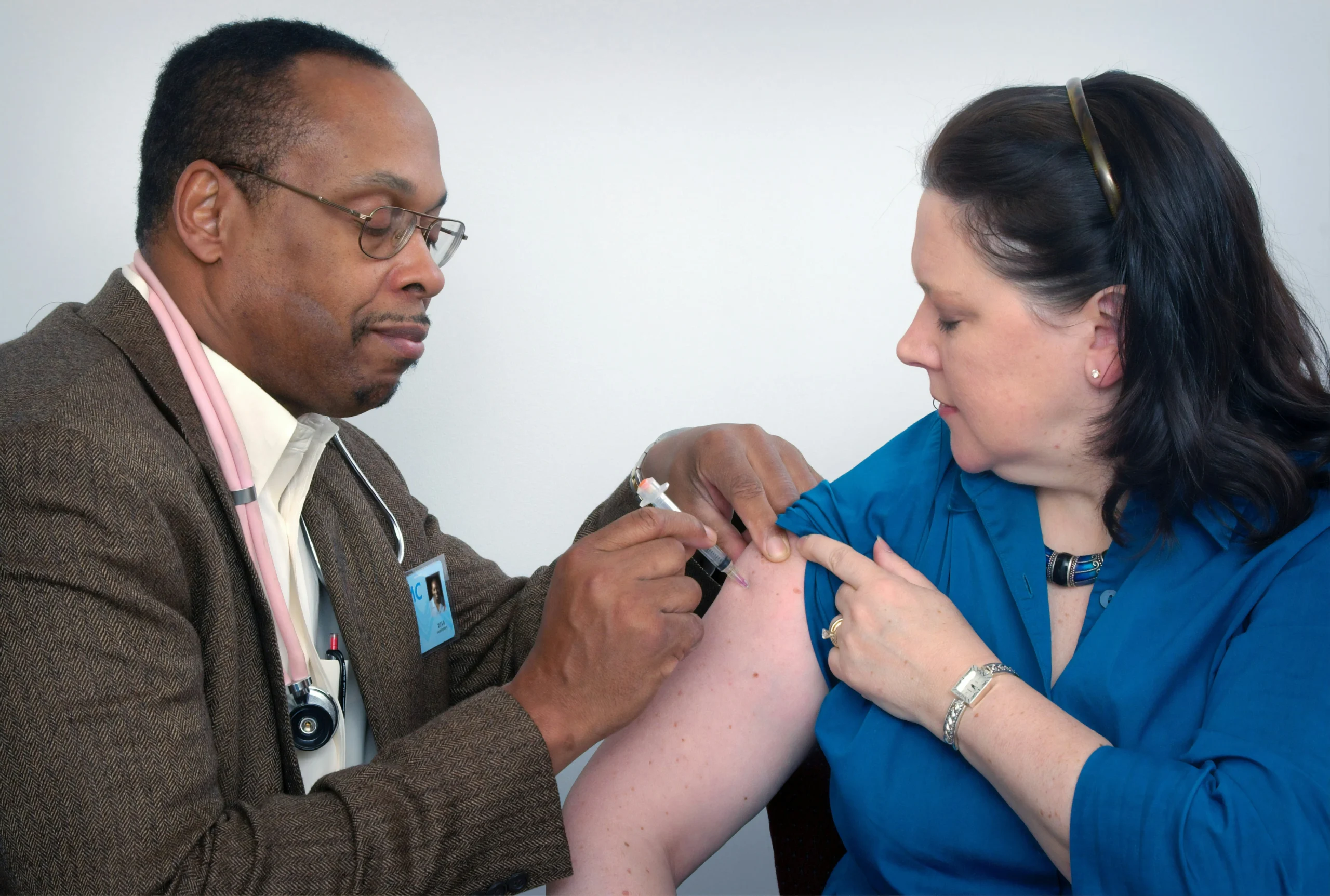 Pneumonia vaccine| VacciBuddy| Doctor giving vaccine on hand to the lady