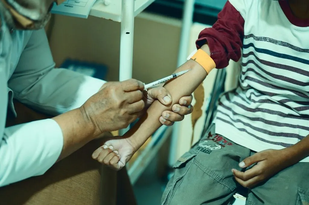 Yellow Fever Vaccine| VacciBuddy| Doctor giving vaccine to a kid